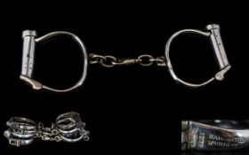 Set Of Four Victorian Shackles / Handcuffs Of Typical Form. Overall Length 9.5 Inches.