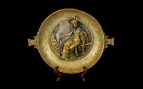 Antique Cast Bronze Twin Handle Dish With Figural Relief Circular bowl with central relief in the