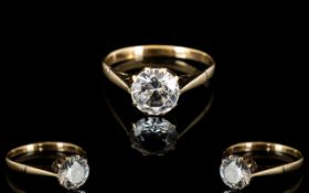 A 9ct Yellow Gold And CZ Set Solitaire Ring Marked 9ct to shank and set with large central faceted