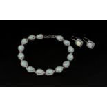 Opal and Zirconia Tennis Bracelet and Pair of Drop Earrings, the bracelet comprising fifteen pear