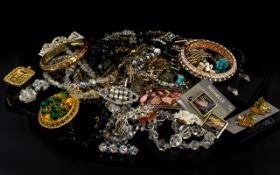 A Mixed Collection Of Costume Jewellery A varied lot to include several paste set brooches,
