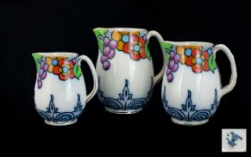 A Collection Of Three Losolware Jugs In Suntrae Design 5510 Circa 1930's, of graduating size,