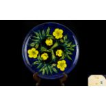 Moorcroft Modern Tubelined Limited Edition Cabinet Plate 'Buttercups' design on blue ground. Dated