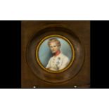 A 19th Century Circular Portrait Miniature Housed in glazed walnut frame,
