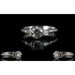 18ct White Gold Attractive Diamond Set Ring From The 1930's The central round brilliant cut