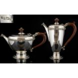 A Well Made Celtic Knotwork Design Solid Silver Teapot And Accompanying Coffee Pot Each of