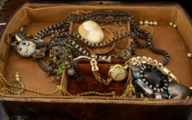 A Jewellery Box Containing A Mixed Collection Of Costume Jewellery To include gold tone watch,