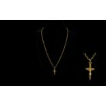9ct Gold Chain and Cross. Both Marked 9ct. Chain length 20 Inches - 50 cm. Gold Weight 6.1 grams.