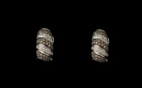 18ct Gold Black And White Diamond Earrings Curved form set with alternating bands of black and