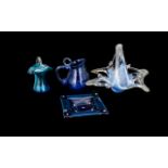A Collection of Blue Glass Decorative Items.