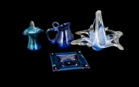 A Collection of Blue Glass Decorative Items.