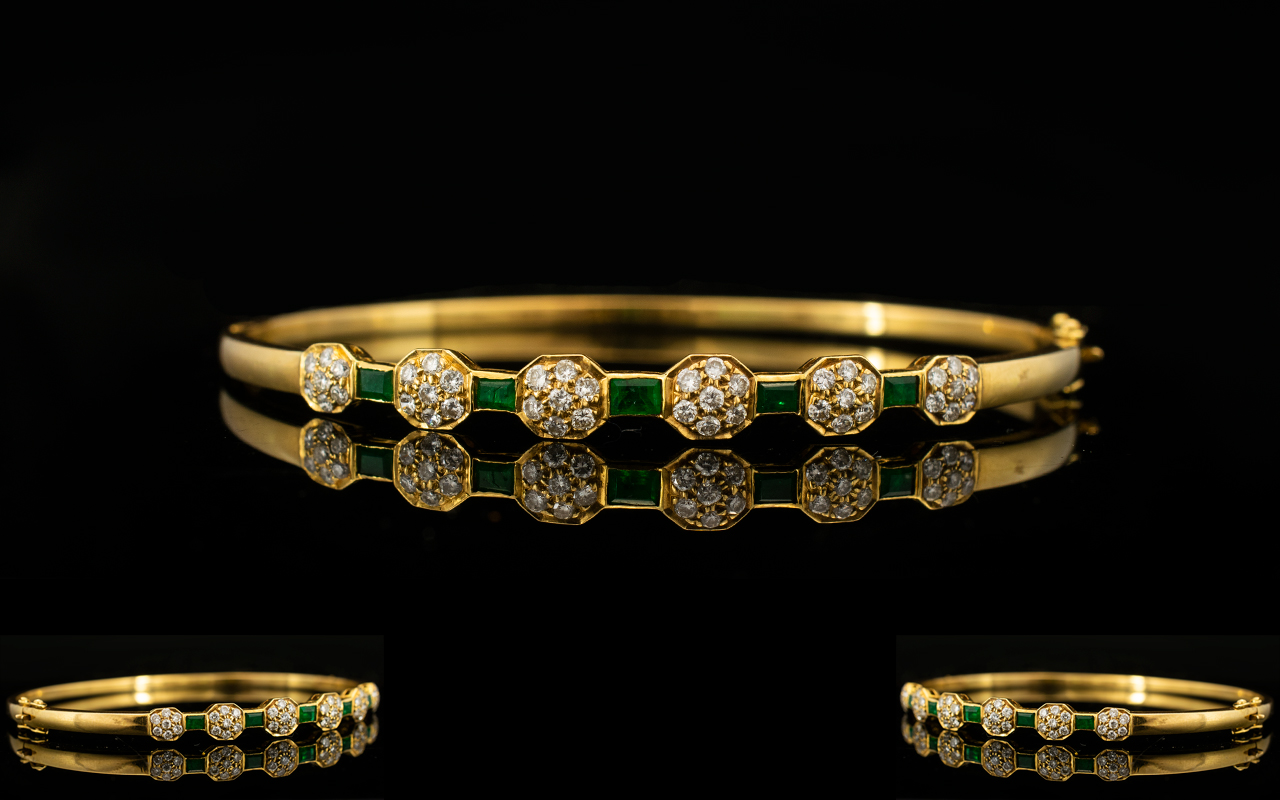 18ct Gold - Attractive Emerald and Diamond Hinged Bangle Set with Six Diamond Flower head Clusters,