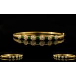 18ct Gold - Attractive Emerald and Diamond Hinged Bangle Set with Six Diamond Flower head Clusters,