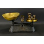 Traditional Kitchen Scales 'The Viking' in black metal with brass weighing bowl, complete with