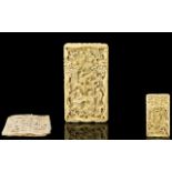 Chinese Early 19th Century Carved Ivory Card Case Profusely carved throughout, depicting figures,