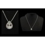 A Stunning And Contemporary Sterling Silver And Faceted CZ Set Pendant Necklace Comprising Fine