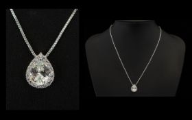 A Stunning And Contemporary Sterling Silver And Faceted CZ Set Pendant Necklace Comprising Fine