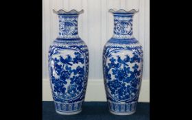 A Pair Of Floor Standing Blue And White Oriental Vases Contemporary ovoid form vases with slim neck