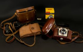 A Collection Of Camera Accessories including Kodak Coloursnap 35 camera, Kodak Film no.