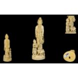 Japanese Very Fine Quality Signed Carved Ivory Figurine (Okimono) In the form of a female deity,