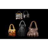 A Collection of Five (5) Decorative Glass Handbags. Assorted styles, in shades of amber and brown.