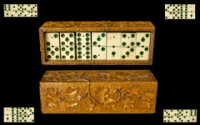 Antique Bone Dominoes In Carved Olive Wood Box Monochrome bone dominoes housed in intricately