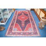 A Traditional And Very Large Afghan Wool Carpet In traditional Persian design with triple borders,