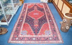 A Traditional And Very Large Afghan Wool Carpet In traditional Persian design with triple borders,