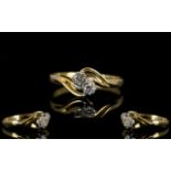 9ct Gold Two Stone Diamond Ring Set with brilliant cut diamonds set on a twist, fully hallmarked,