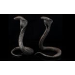 A Pair Of Antique Case Metal Cobras. In