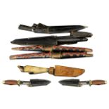 A Collection Of Six Display Daggers Various designs, mostly tourist pieces,