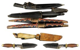 A Collection Of Six Display Daggers Various designs, mostly tourist pieces,