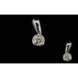 9ct White Gold And Diamond Pendant Single stone pendant with rub over setting stamped 375