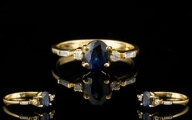 18 Carat Gold Sapphire and Diamond Set Dress Ring of contemporary design.