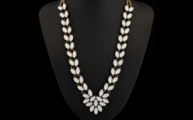 Faux Moonstone Statement Necklace, pairs of marquise shape faux moonstones form each side of the