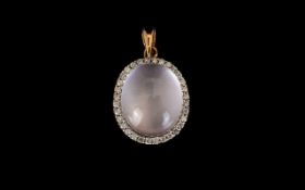 A 9ct Rose Gold And Diamond Set Pendant Oval form pendant set with shell pink opalescent cabochon,
