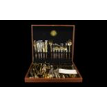 A Large Canteen Of Bronzed Cutlery Thai cutlery set housed in fitted case,