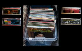 A Collection Of Vinyl Records All in original sleeves, approx 90 in total to include Elvis,