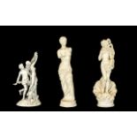 A Collection Of Three Reproduction Classical Figures Each raised on circular base, the tallest,