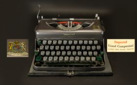 An Imperial Good Companion Standard Model Typewriter In good order with instruction book and