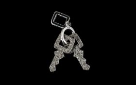 9ct White Gold Pendant In The Form Of A Keyring And Two Diamond Set Keys Fully hallmarked,