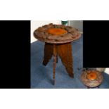 Anglo Indian Carved Occasional Table Raised on carved, tapering quatrefoil legs,
