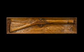 Military Interest Carved Wooden Plaque With Flintlock Rifle Design 32 x 7 1/2 inches,