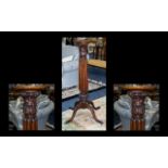 An Early 20th Century Mahogany Torchere Of large proportion raised on trefoil base with acanthus
