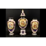 A Victorian Opaline Glass Three Piece Garniture Set Each with Handpainted enamels with central