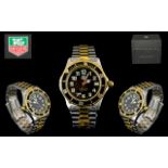 Tag Heuer Gents Sports Wristwatch Black dial with luminous Arabic numerals,black rotating bezel,