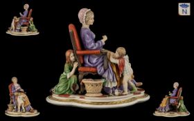 Capodimonte Signed and Impressive Porcelain Figure Group - A Young Mother Seated on a Chair Sewing