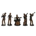 A Group Of Cast Metal Figurines In The Form Of A Jazz Band Cast spelter figures, each cold painted