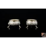 Victorian Period Pair of Solid Silver Salts Decorated In Embossed Images of Leaves and Flowers,