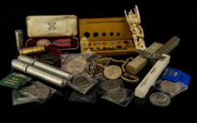 A Mixed Collection Of Oddments And Ephemera A varied lot to include various commemorative coins,